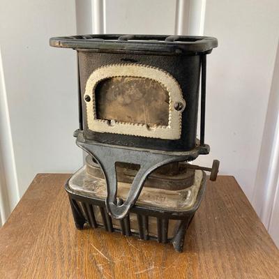 LOT 59: Antique Cast Iron Fairy Queen Stove / Lantern