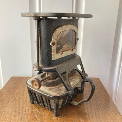 LOT 59: Antique Cast Iron Fairy Queen Stove / Lantern
