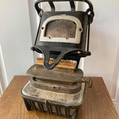 LOT 59: Antique Cast Iron Fairy Queen Stove / Lantern