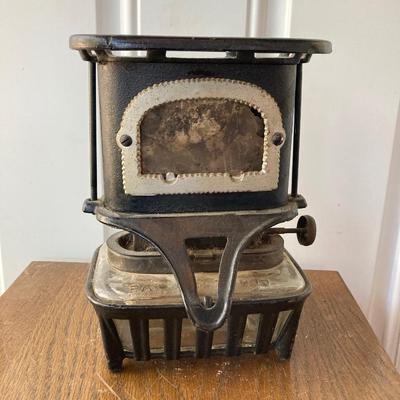 LOT 59: Antique Cast Iron Fairy Queen Stove / Lantern