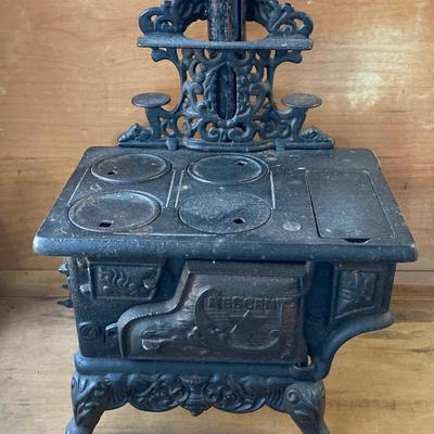 LOT 66: Vintage Miniature Crescent Cast Iron Stove with Cookware