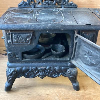 LOT 66: Vintage Miniature Crescent Cast Iron Stove with Cookware