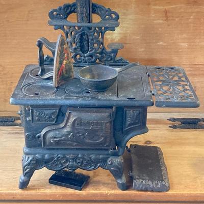 LOT 66: Vintage Miniature Crescent Cast Iron Stove with Cookware