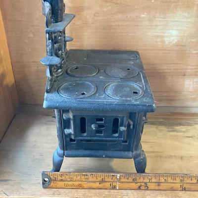 LOT 66: Vintage Miniature Crescent Cast Iron Stove with Cookware