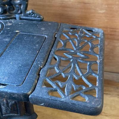 LOT 66: Vintage Miniature Crescent Cast Iron Stove with Cookware