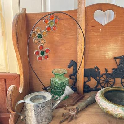 LOT 69: Children's Wooden Bench / Seat with Pottery, Watering Cans, MCM Wood Based Green Glass Vase with Stained Glass Flowers,...