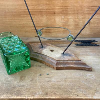 LOT 69: Children's Wooden Bench / Seat with Pottery, Watering Cans, MCM Wood Based Green Glass Vase with Stained Glass Flowers,...