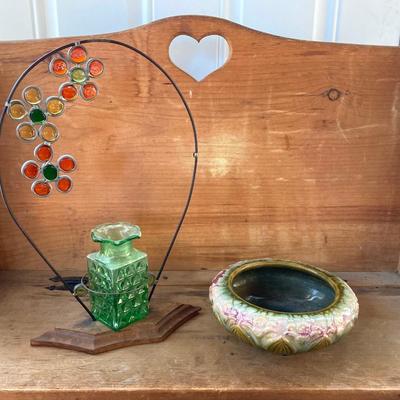 LOT 69: Children's Wooden Bench / Seat with Pottery, Watering Cans, MCM Wood Based Green Glass Vase with Stained Glass Flowers,...