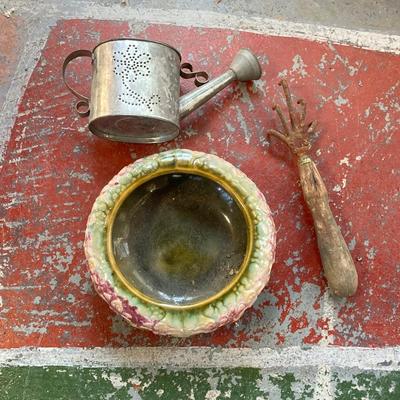 LOT 69: Children's Wooden Bench / Seat with Pottery, Watering Cans, MCM Wood Based Green Glass Vase with Stained Glass Flowers,...