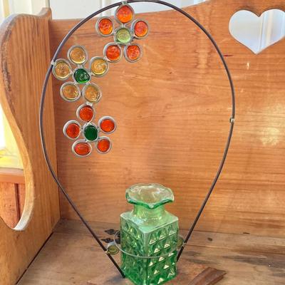 LOT 69: Children's Wooden Bench / Seat with Pottery, Watering Cans, MCM Wood Based Green Glass Vase with Stained Glass Flowers,...