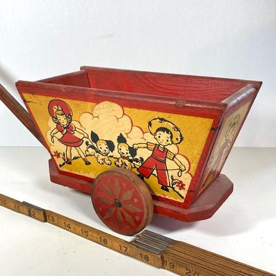 LOT 75: Vintage Children's Toys - Watering Cans, Doll (The Sun Rubber Co / Ruth E Newton), Wooden Cart, Books and More