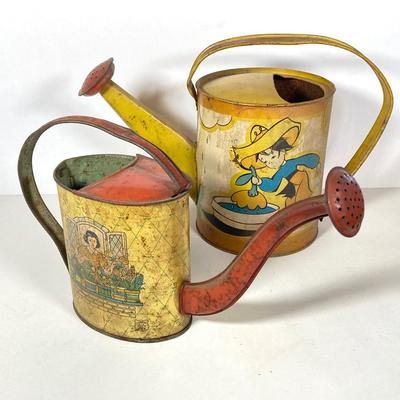 LOT 75: Vintage Children's Toys - Watering Cans, Doll (The Sun Rubber Co / Ruth E Newton), Wooden Cart, Books and More