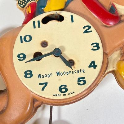 LOT 76: Vintage Woody Woodpecker Clock (Columbia Time Products), Popeye and Wimpy Ramp Walking Toy by Marx and Huckleberry Hound and His...