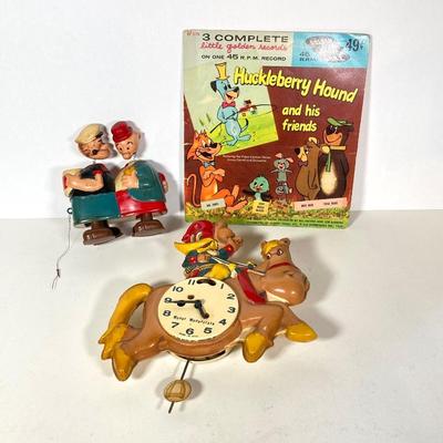 LOT 76: Vintage Woody Woodpecker Clock (Columbia Time Products), Popeye and Wimpy Ramp Walking Toy by Marx and Huckleberry Hound and His...