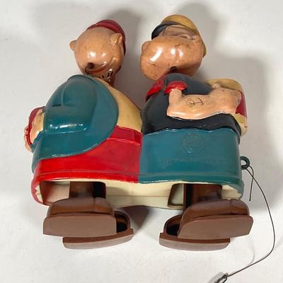 LOT 76: Vintage Woody Woodpecker Clock (Columbia Time Products), Popeye and Wimpy Ramp Walking Toy by Marx and Huckleberry Hound and His...