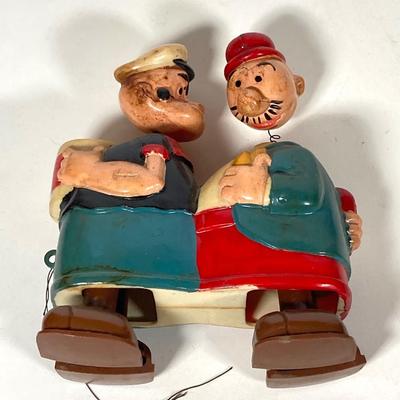 LOT 76: Vintage Woody Woodpecker Clock (Columbia Time Products), Popeye and Wimpy Ramp Walking Toy by Marx and Huckleberry Hound and His...