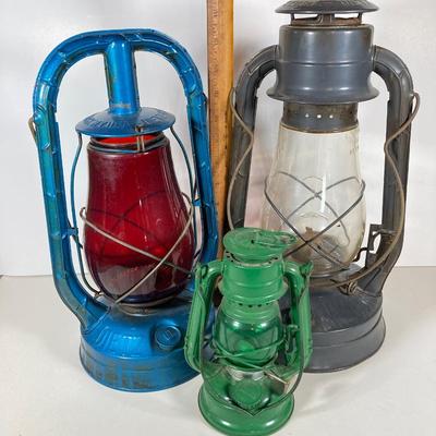 LOT 80: Vintage Oil Lanterns - 2 Dietz (Blue / Gray) and 1 Green Winged Wheel