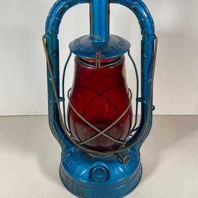 LOT 80: Vintage Oil Lanterns - 2 Dietz (Blue / Gray) and 1 Green Winged Wheel