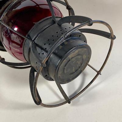 LOT 81: Vintage Black and Red Dressel Oil Lantern and Two Winged Wheel (Yellow and Red)