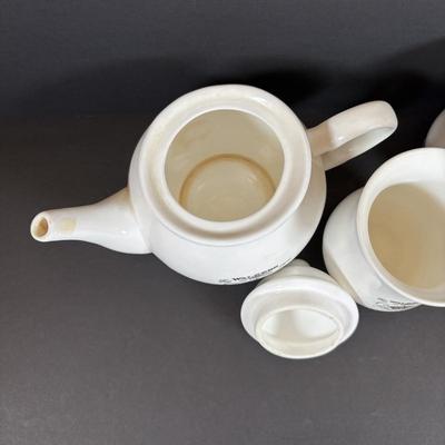 LOT 82: Tea-Time: McCormick Tea Baltimore, Md Teapot, Walkers of London Teapot & Mugs, Thomas Kinkade Mug, Norman Rockwell Mugs Set...