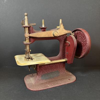 LOT 86: Vintage Toy Sewing Maching