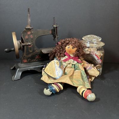 LOT 88: Antique Toy Sewing Machine Made in Germany, Sewing Notions & Button Shelf Sitter Doll