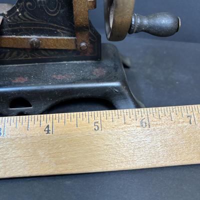LOT 88: Antique Toy Sewing Machine Made in Germany, Sewing Notions & Button Shelf Sitter Doll