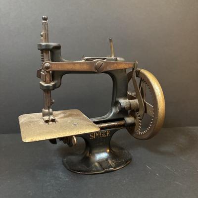 LOT 90: Antique Singer Childs Toy Sewing Machine & More