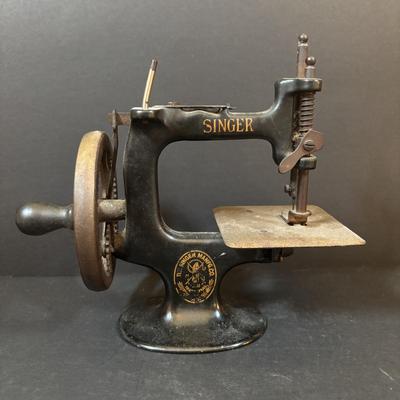LOT 90: Antique Singer Childs Toy Sewing Machine & More