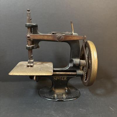 LOT 90: Antique Singer Childs Toy Sewing Machine & More