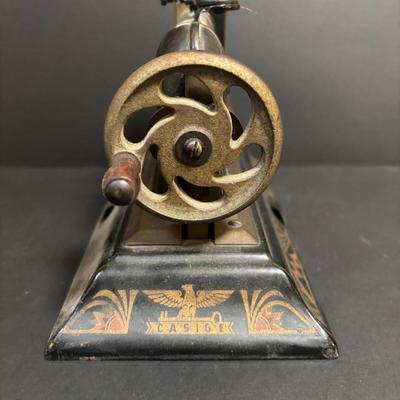 LOT 91: Vintage Casige 1015 Toy Sewing Machine
