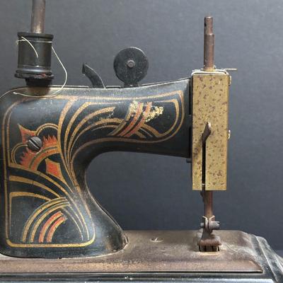 LOT 91: Vintage Casige 1015 Toy Sewing Machine