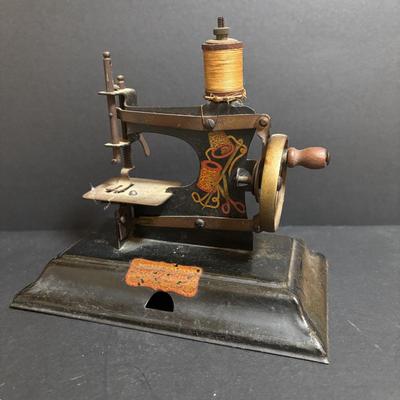 LOT 92: Vintage Casige Childrens Toy Sewing Machine, Germany