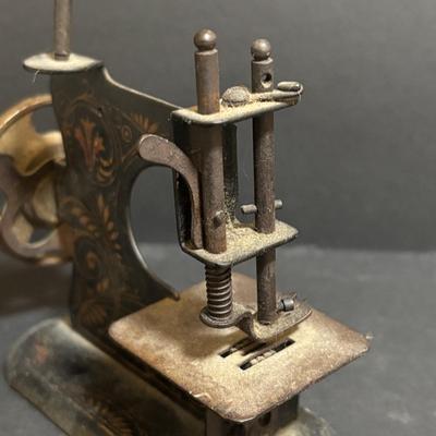 LOT 94: Made in Germany Hand Crank Toy Sewing Machine & Miniature China Dog Pin Cushion