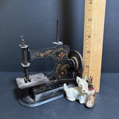 LOT 94: Made in Germany Hand Crank Toy Sewing Machine & Miniature China Dog Pin Cushion