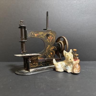 LOT 94: Made in Germany Hand Crank Toy Sewing Machine & Miniature China Dog Pin Cushion