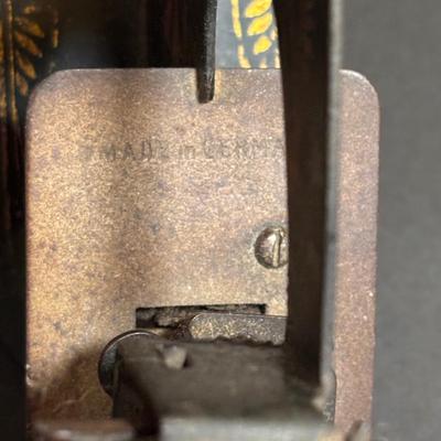 LOT 94: Made in Germany Hand Crank Toy Sewing Machine & Miniature China Dog Pin Cushion