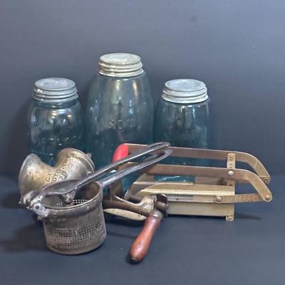 LOT 96: Kitchen Collection: Vintage Mason (2) & Atlas (1) Canning Jars w/Zinc Lids & Milk Glass Inserts, Ricer, French Fry Maker...