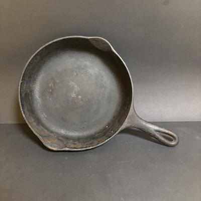 LOT 99: Unmarked Cast Iron Skillet, Zwilling Steak Knife Set, Trivets & Flint Stainless Steel Hanging Kitchen Utensil Set