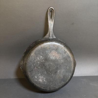 LOT 99: Unmarked Cast Iron Skillet, Zwilling Steak Knife Set, Trivets & Flint Stainless Steel Hanging Kitchen Utensil Set