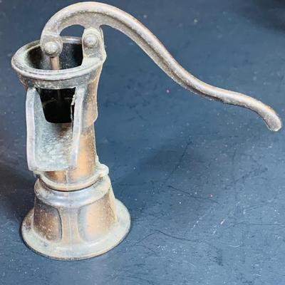 LOT 112: Collection of Cast Iron Amish Figurines and Salt and Pepper Shakers, and Vintage Pencil Sharpeners