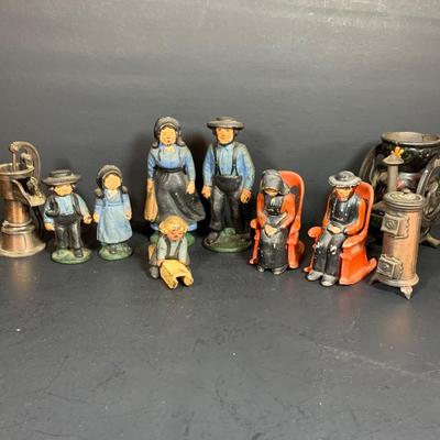 LOT 112: Collection of Cast Iron Amish Figurines and Salt and Pepper Shakers, and Vintage Pencil Sharpeners