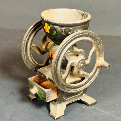 LOT 112: Collection of Cast Iron Amish Figurines and Salt and Pepper Shakers, and Vintage Pencil Sharpeners