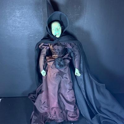 LOT 113: Collection of Wizard of Oz Franklin Heirloom Hand Painted Porcelain Dolls -Wicked Witch of the West, Glinda, Lollipop Boy and...