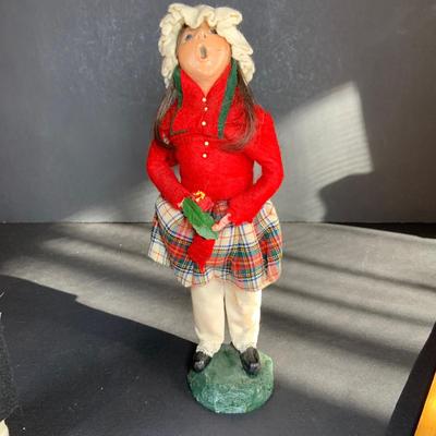 LOT 114: Set of 3 Byers' Choice Carolers - Two (2) Children From 1982 with Signed Bases and a Ginger Bread Seller and Stand from 1996