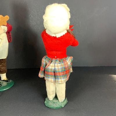 LOT 114: Set of 3 Byers' Choice Carolers - Two (2) Children From 1982 with Signed Bases and a Ginger Bread Seller and Stand from 1996