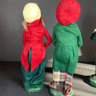 LOT 115: Collection of Four (4) Vintage Byers Choice Caroler Two (2) Women with Muff Hand Warmers and Two (2) Men with Sheet Music all...