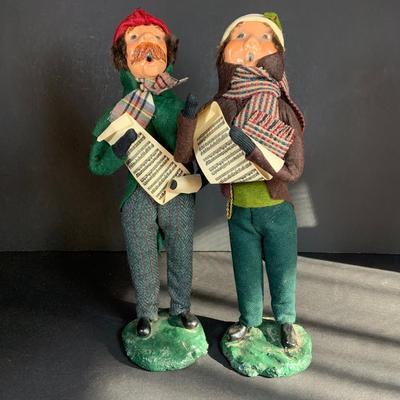 LOT 115: Collection of Four (4) Vintage Byers Choice Caroler Two (2) Women with Muff Hand Warmers and Two (2) Men with Sheet Music all...