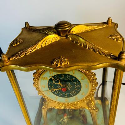 LOT 123: Vintage Electric United Motion Mantle Clock Model No. 990 Victorian Dancers