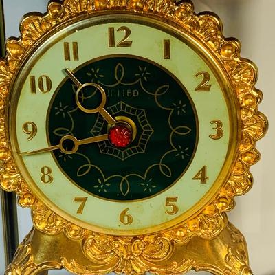 LOT 123: Vintage Electric United Motion Mantle Clock Model No. 990 Victorian Dancers